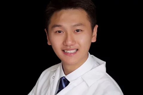 Dr. Li smiling