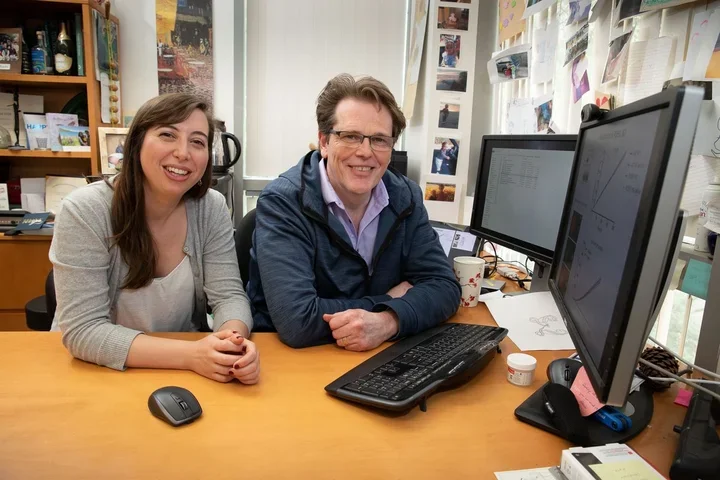 Kent Hill and Stephanie DeMarco in the office