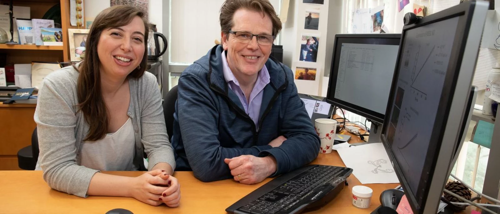 Kent Hill and Stephanie DeMarco in the office